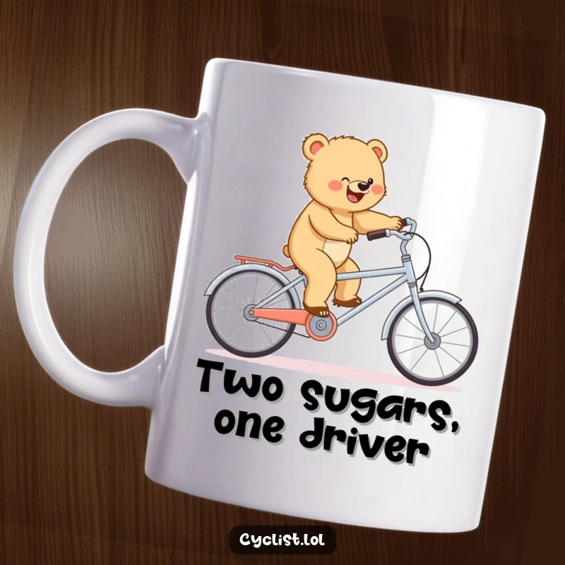Funny mug showing a determined bear cub bravely balancing on a miniature tandem bike, a humorous gift for adventure seekers.