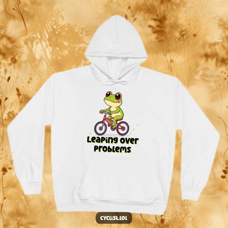 Funny frog hoodie featuring a playful frog expertly navigating a bicycle over tiny obstacles, combining warmth with a sense of agile fun.