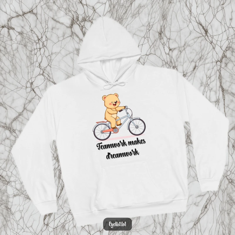 Funny hoodie depicting a determined bear cub balancing on a tiny tandem bike, offering warmth and humorous inspiration.