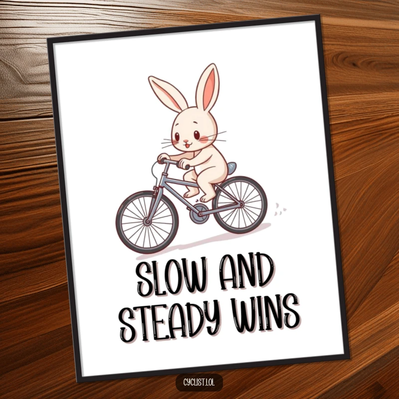 Funny Free Printable Rabbit Wall Art: A determined rabbit character pedals a tiny bicycle uphill with visible effort.