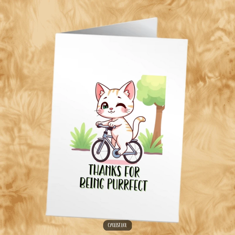 Free Printable Thank You Card: A curious cat with a playful smirk rides a bike, looking back with mischievous eyes.